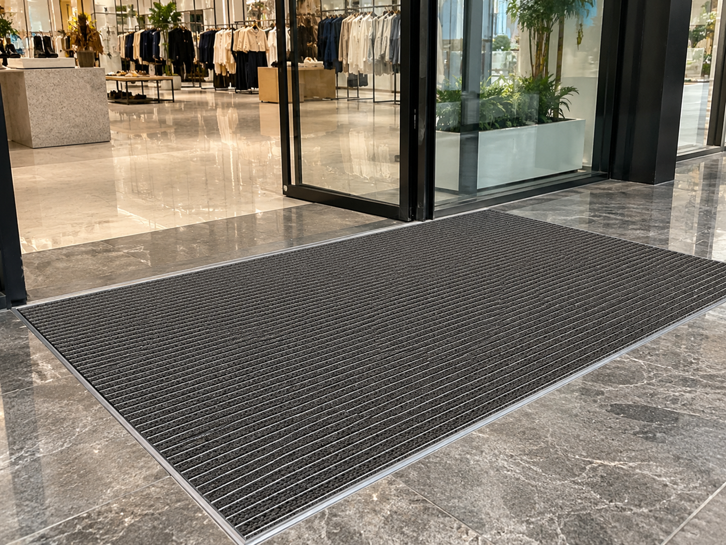 Commercial aluminum entrance mat system at a shopping mall